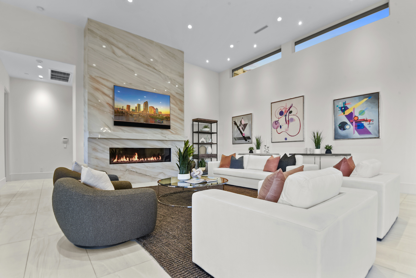 Bright living room with luxury real estate staging and elegant artwork. | Utopia Luxury Home Staging & Design