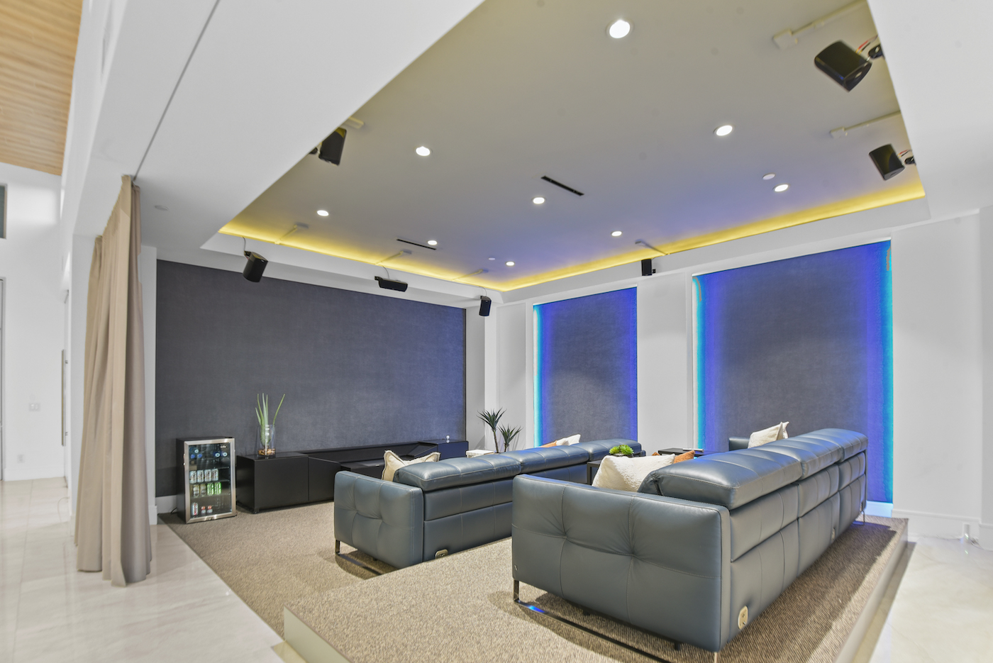 Case Studies 5 | Luxury Home Staging & Design in Las Vegas Upscale home staging highlights a plush, modern entertainment room. | Utopia Luxury Home Staging & Design